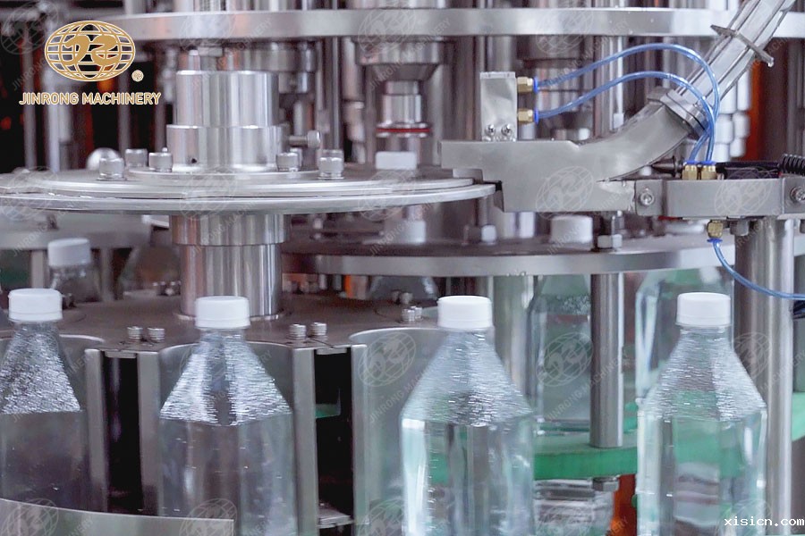 果汁茶饮料灌装机旋盖部分 果汁茶饮料灌装机旋盖部分